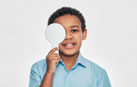 Boy doing an eye test