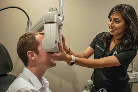 Dr. Prapti Chandrani performing an eye exam at Somerset Eye Care in NJ