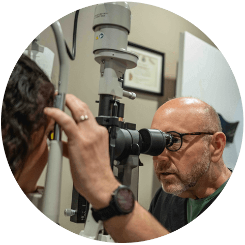 Dr. Jonathan Fishbein of Somerset Eye Care performing an eye exam
